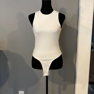 NWOT beautiful white body suit